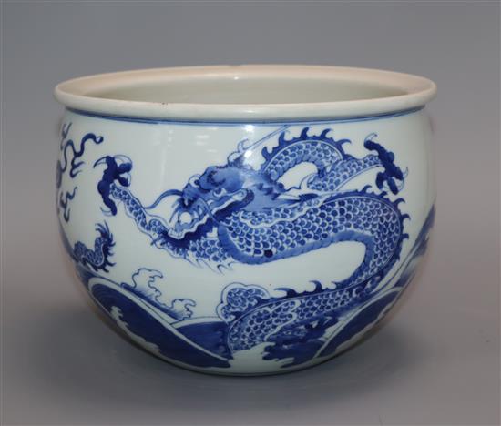 A Chinese blue and white dragon jardiniere height 16cm